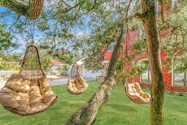 a view of a couches and tables in the patio