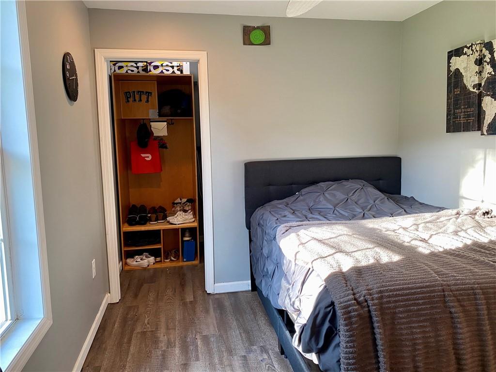 1217 Sarver Road Sarver, PA 16055 - Photo 13 of 23 a bed sitting in a bedroom next to a window