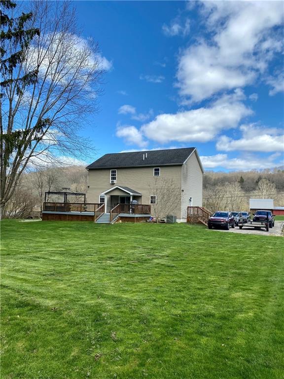 1217 Sarver Road Sarver, PA 16055 - Photo 18 of 23 a front view of a house with a garden