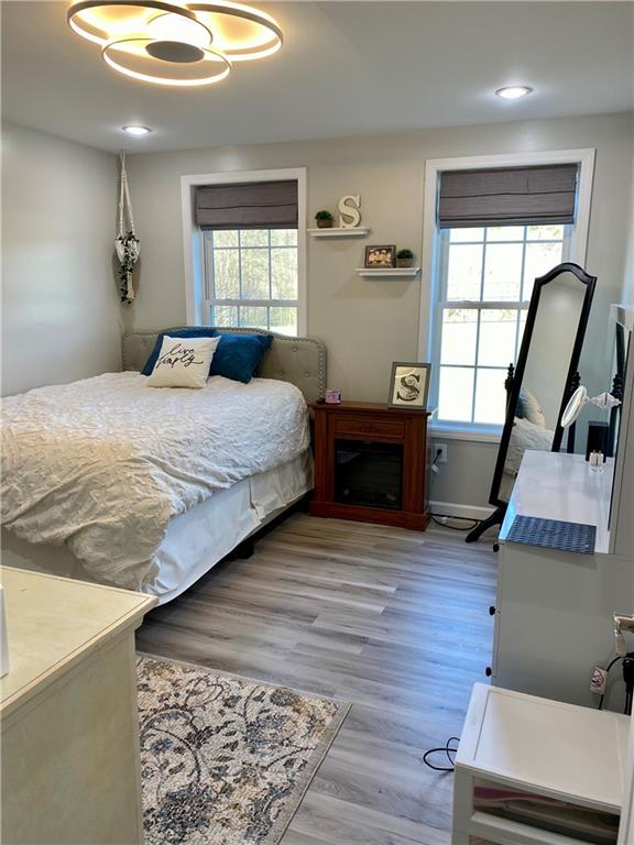 1217 Sarver Road Sarver, PA 16055 - Photo 10 of 23 a bedroom with a bed a mirror and a window