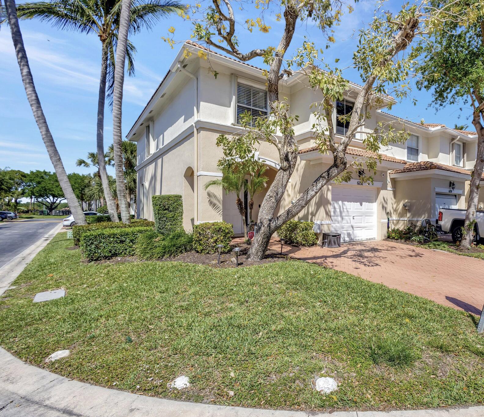 6132 Seminole Gardens Circle Riviera Beach, FL 33418 - Photo 2 of 63 36-web-or-mls-5D1A5154