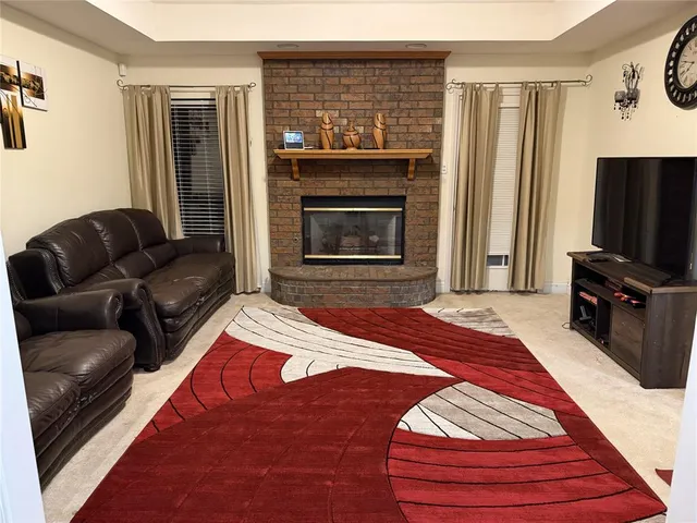 a bedroom with a bed and a television