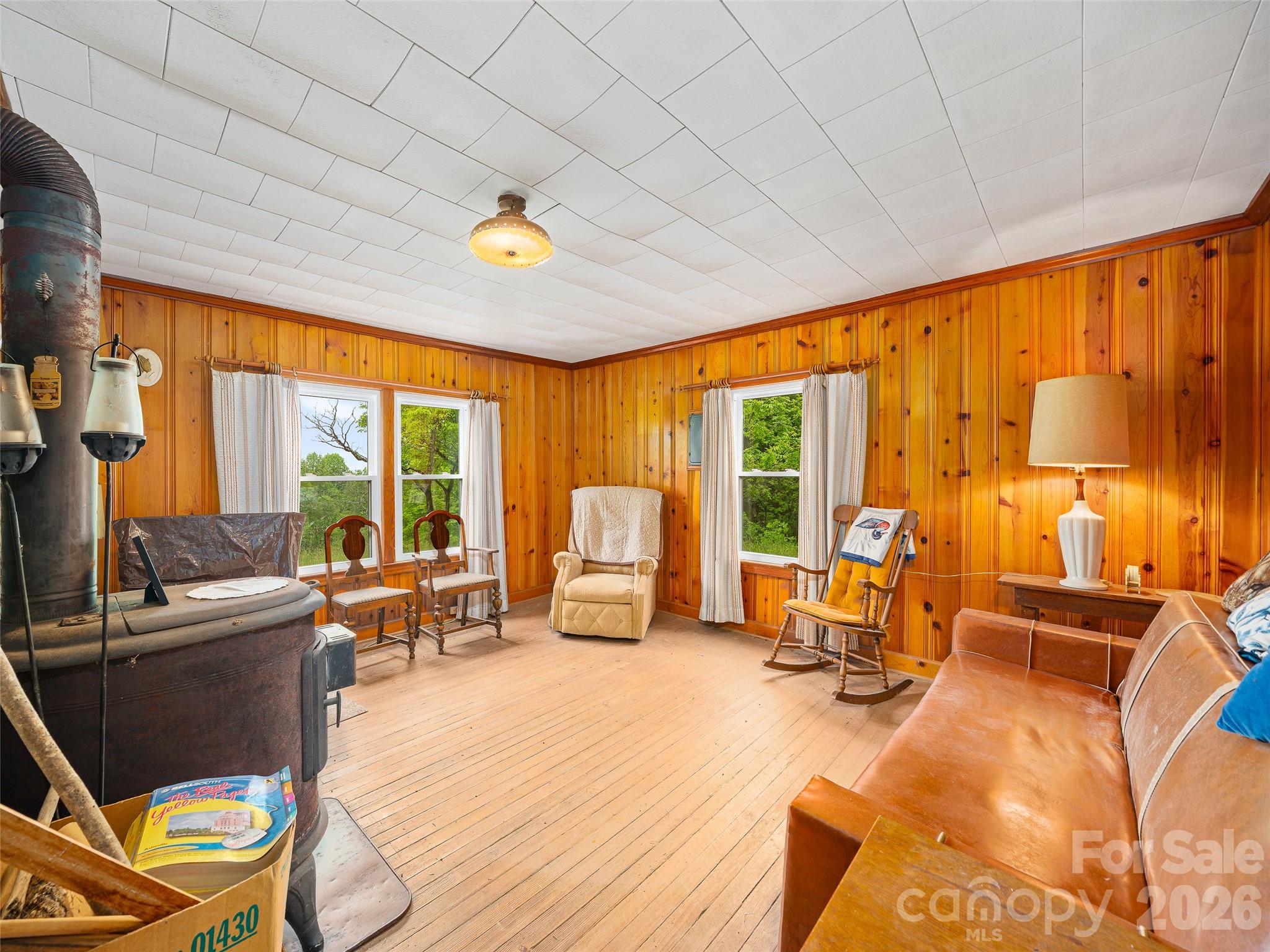 2380 Old Fort Road Black Mountain, NC 28711 - Photo 14 of 27 a view of a livingroom with furniture and floor to ceiling window