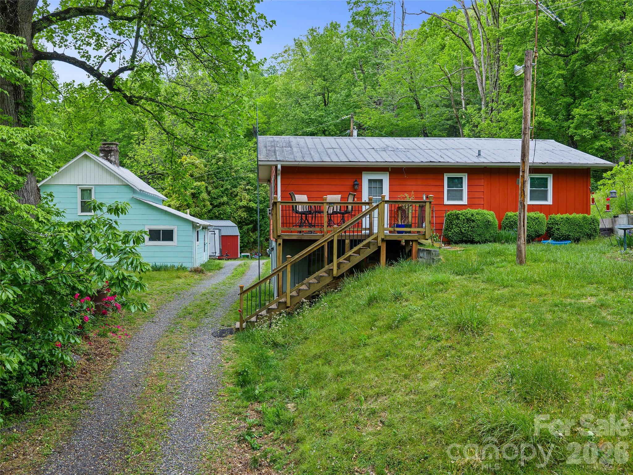2380 Old Fort Road Black Mountain, NC 28711 - Photo 18 of 27 a view of a house with a yard