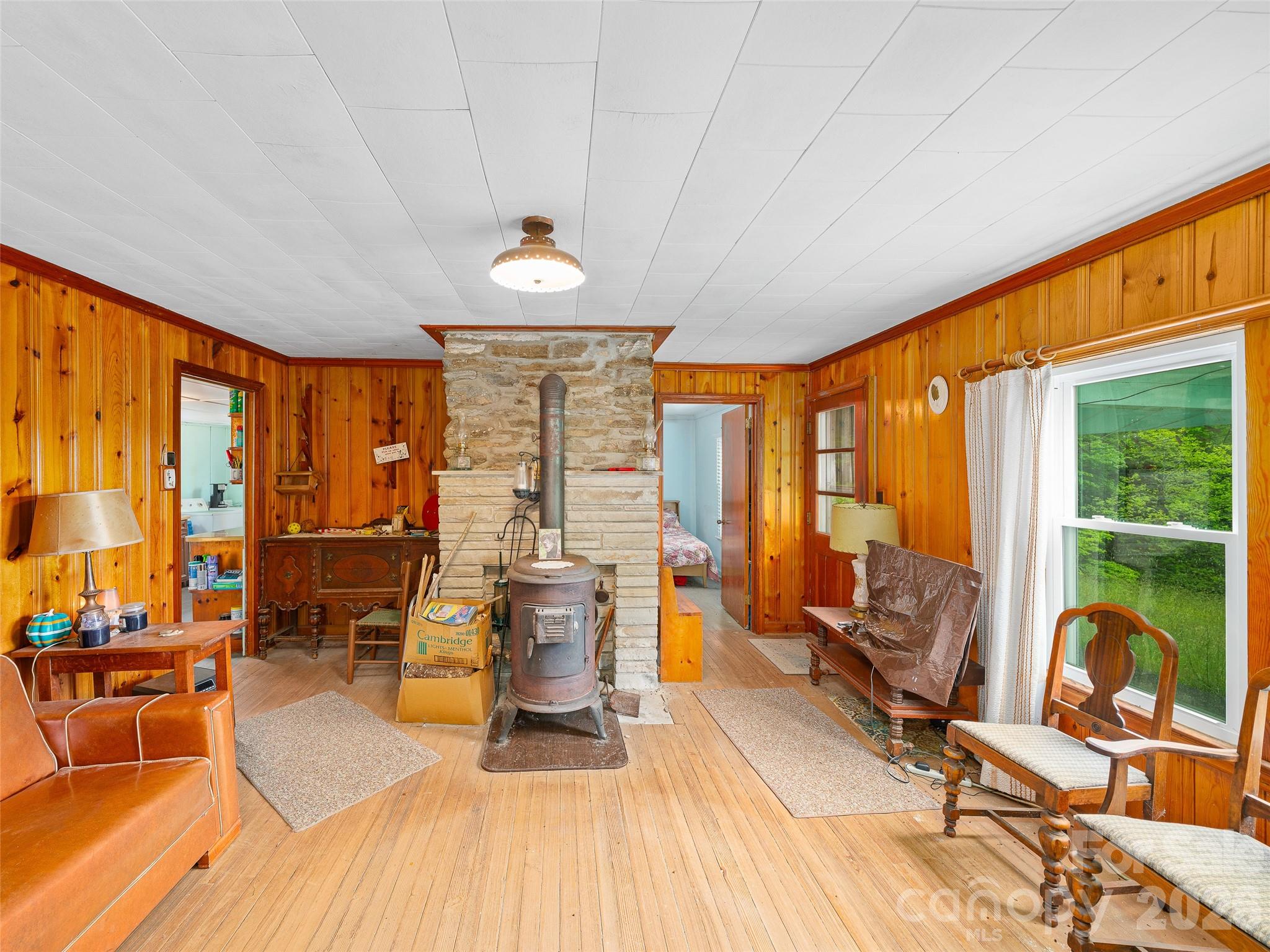 2380 Old Fort Road Black Mountain, NC 28711 - Photo 10 of 27 a very nice looking living room with a large window and dining table
