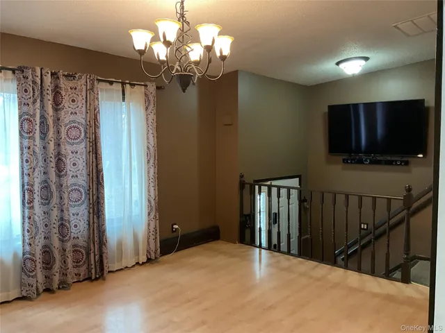 a view of a livingroom with a chandelier