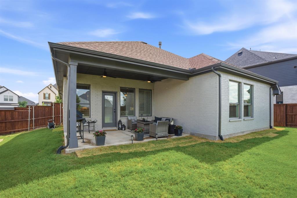 1632 Cotton Road Van Alstyne, TX 75495 - Photo 28 of 40 a view of a house with a yard porch and sitting area