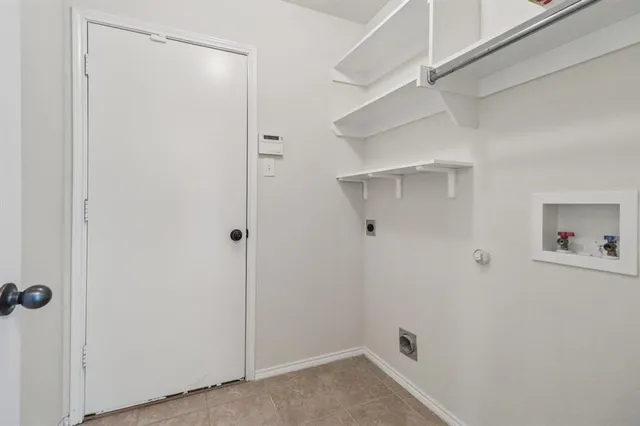 a bathroom with a bathtub and a sink