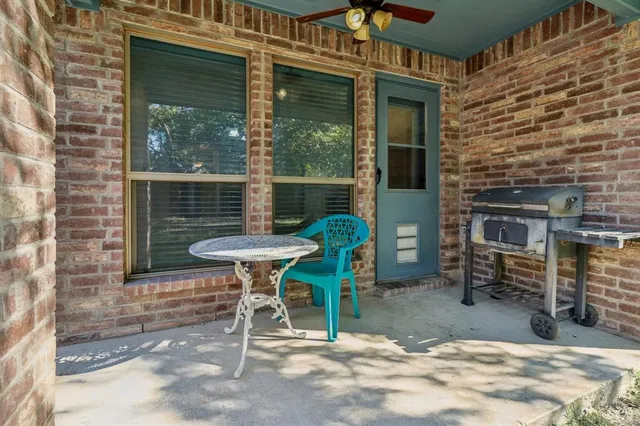 a view of a room with windows