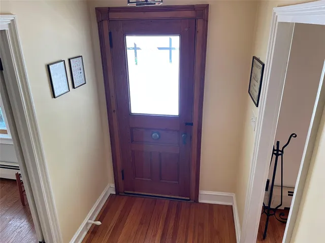 a view of front door with stairs
