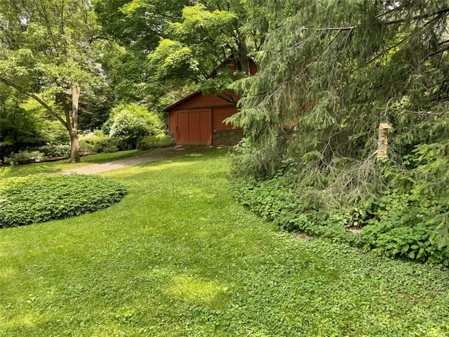 a fire hydrant in the middle of a field