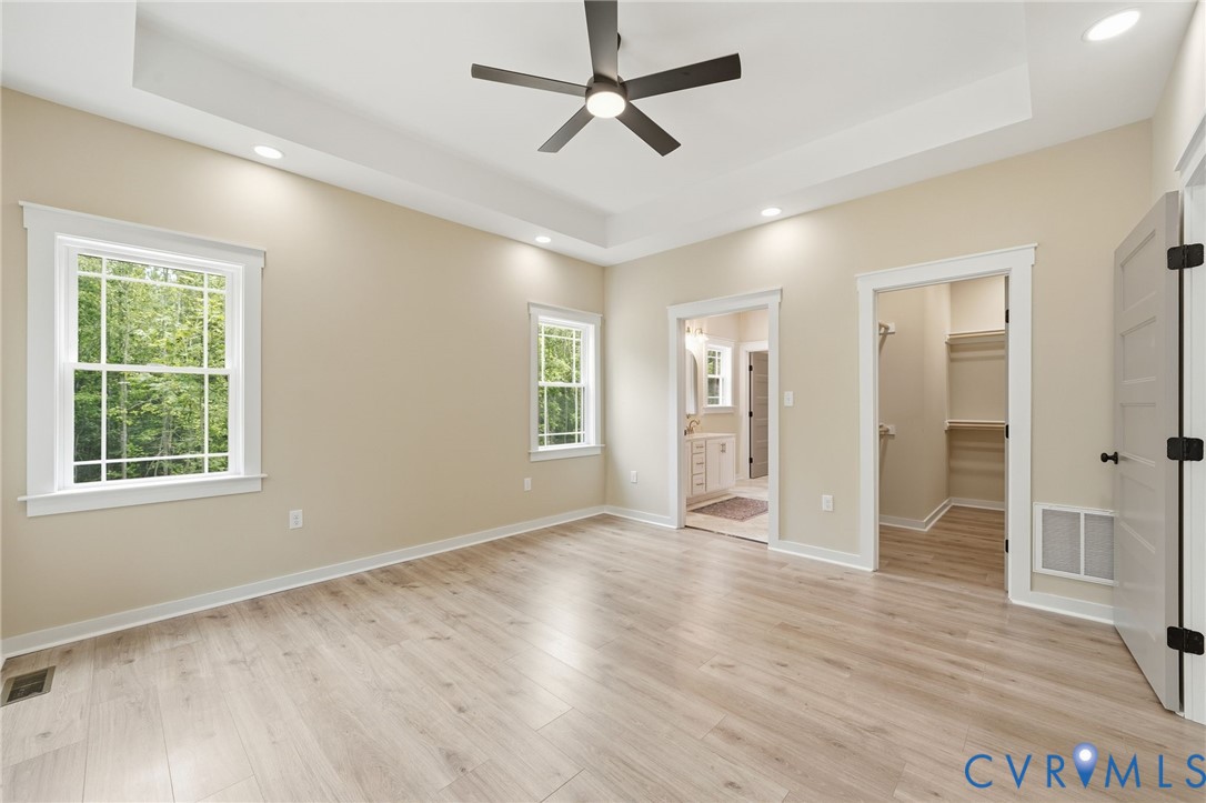 239 Bumpass Road Bumpass, VA 23024 - Photo 24 of 44 Spacious room with wood-finish flooring, two windo