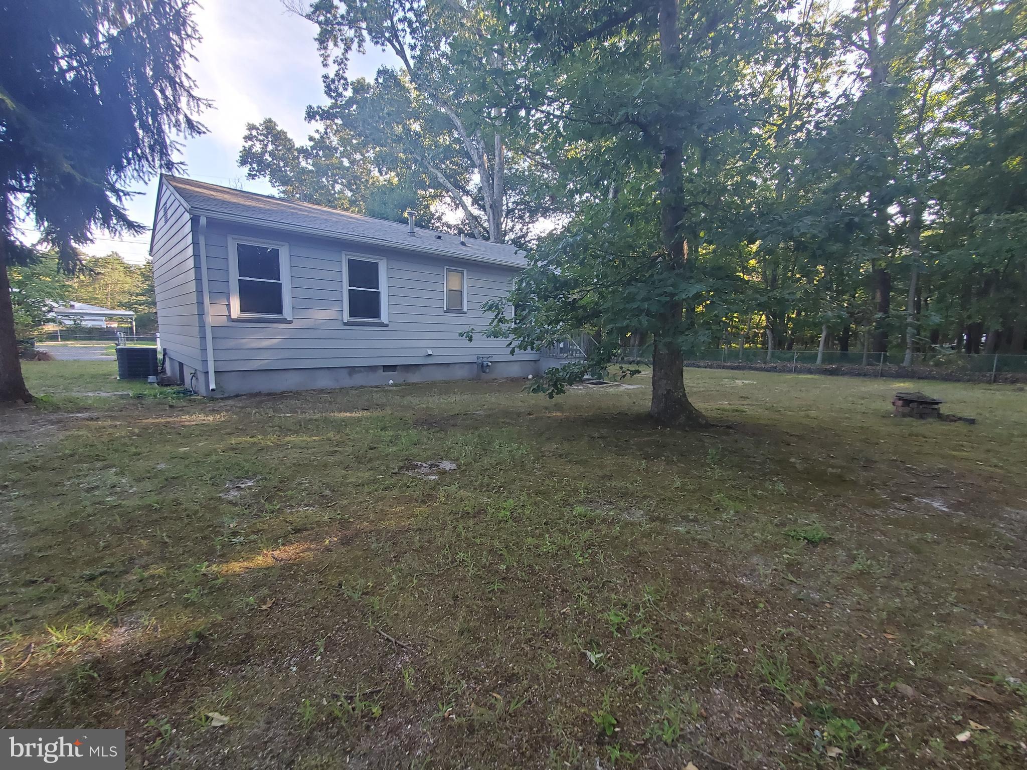 813 Hickory Avenue Browns Mills, NJ 08015 - Photo 13 of 13 a view of a house with a yard