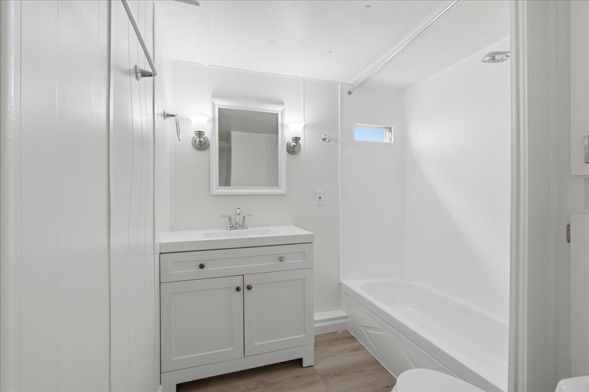 1525 Cold Springs Road, Unit 48 Placerville, CA 95667 - Photo 15 of 23 a bathroom with a tub sink shower and mirror