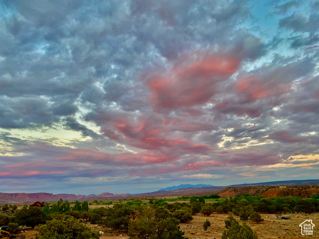 213 South 975 West, Unit 4 Torrey, UT 84775 - Photo 22 of 34 Sunset hinged clouds over Capitol Reef National Park