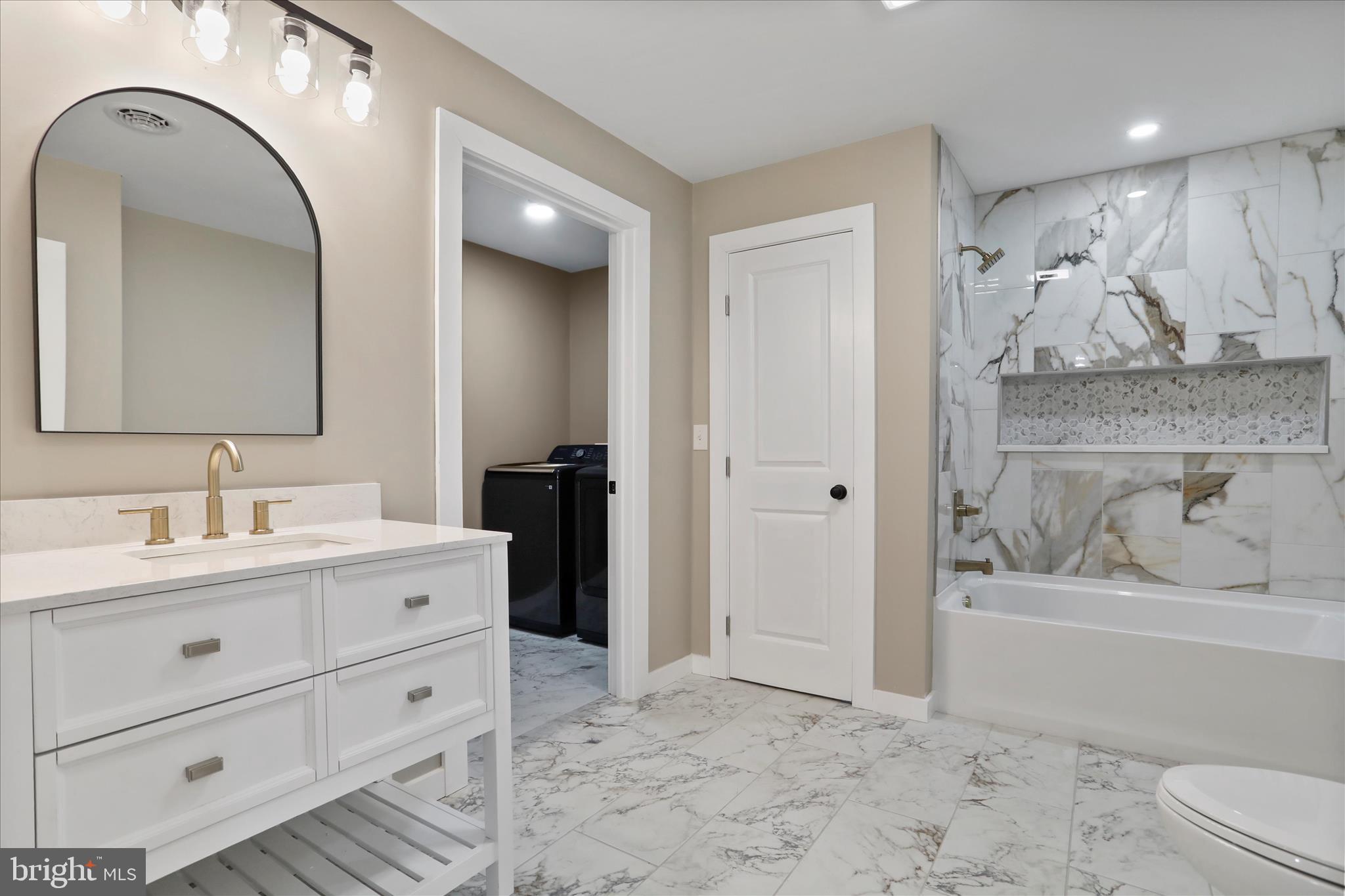 30 Dry Run Road Burlington, WV 26710 - Photo 22 of 42 Main bathroom with attached laundry!