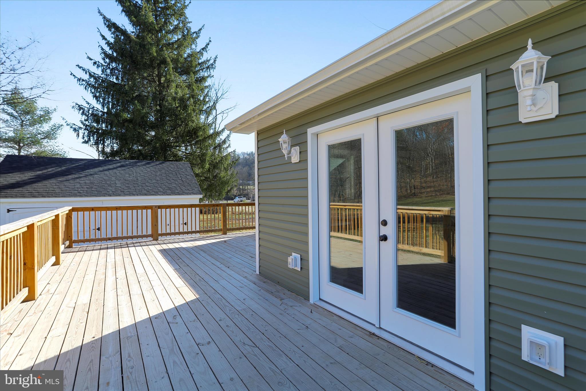 30 Dry Run Road Burlington, WV 26710 - Photo 28 of 42 Large rear deck with patio doors off the kitchen!