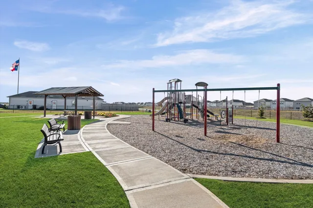 a view of a swimming pool with a garden and stairs