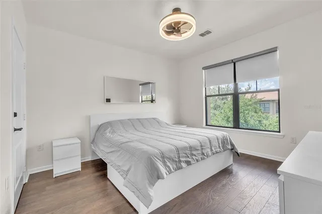 a kitchen with stainless steel appliances granite countertop a refrigerator a sink a stove a microwave and island