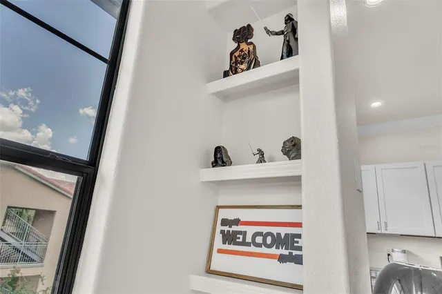 a view of a street from a balcony