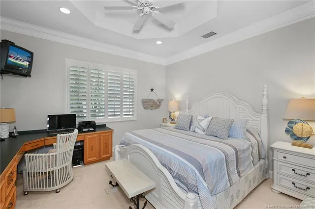 a bedroom with bed and a window