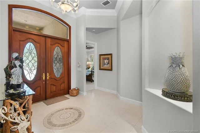 a view of that has a mirror and a table in it