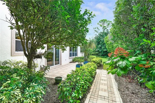 a view of a garden with pathway