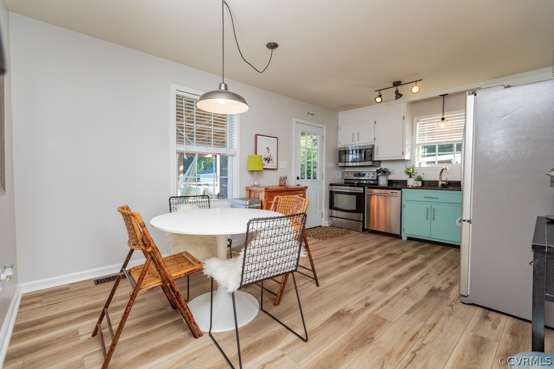19821 River Road Sutherland, VA 23885 - Photo 12 of 43 Kitchen dining area with new wood floors