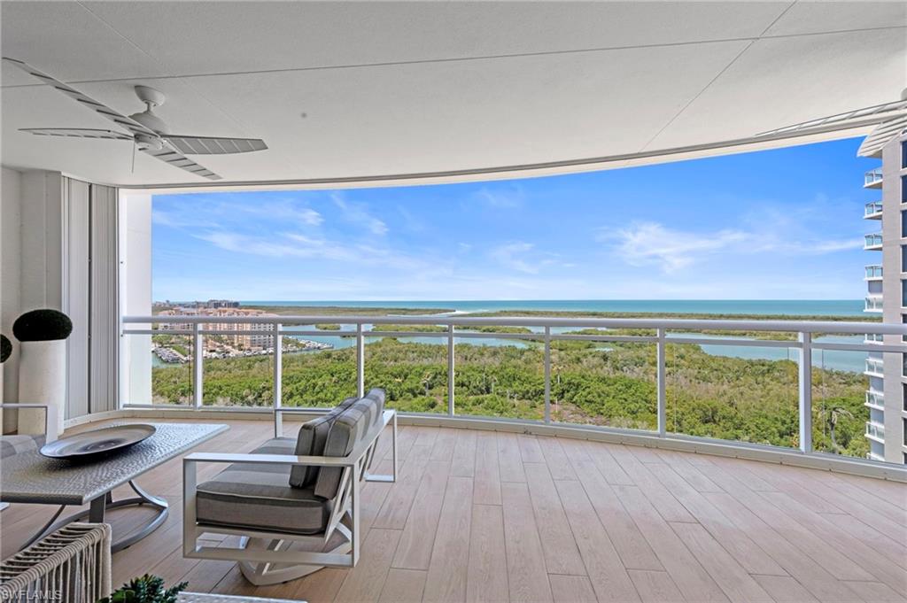 13915 Old Coast Road, Unit 1706 Naples, FL 34110 - Photo 23 of 49 a view of roof deck with furniture