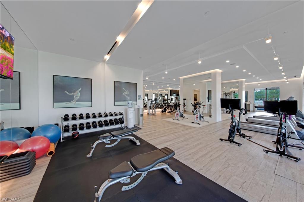 13915 Old Coast Road, Unit 1706 Naples, FL 34110 - Photo 44 of 49 a view of a room with gym equipment