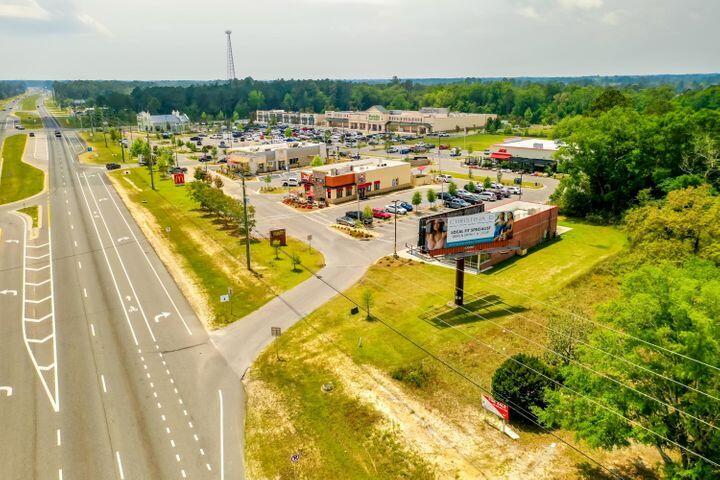 Lot 27 Fishermans Run Freeport, FL 32439 - Photo 8 of 11 a view of a swimming pool with outdoor seating and yard