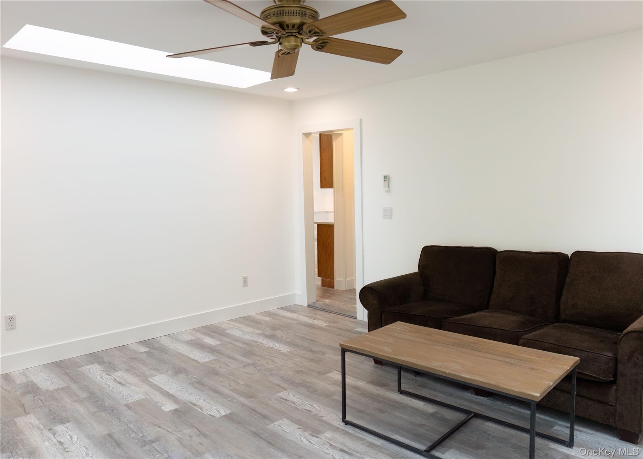 23 Lucille Road Carmel, NY 10512 - Photo 27 of 44 a living room with furniture and a ceiling fan