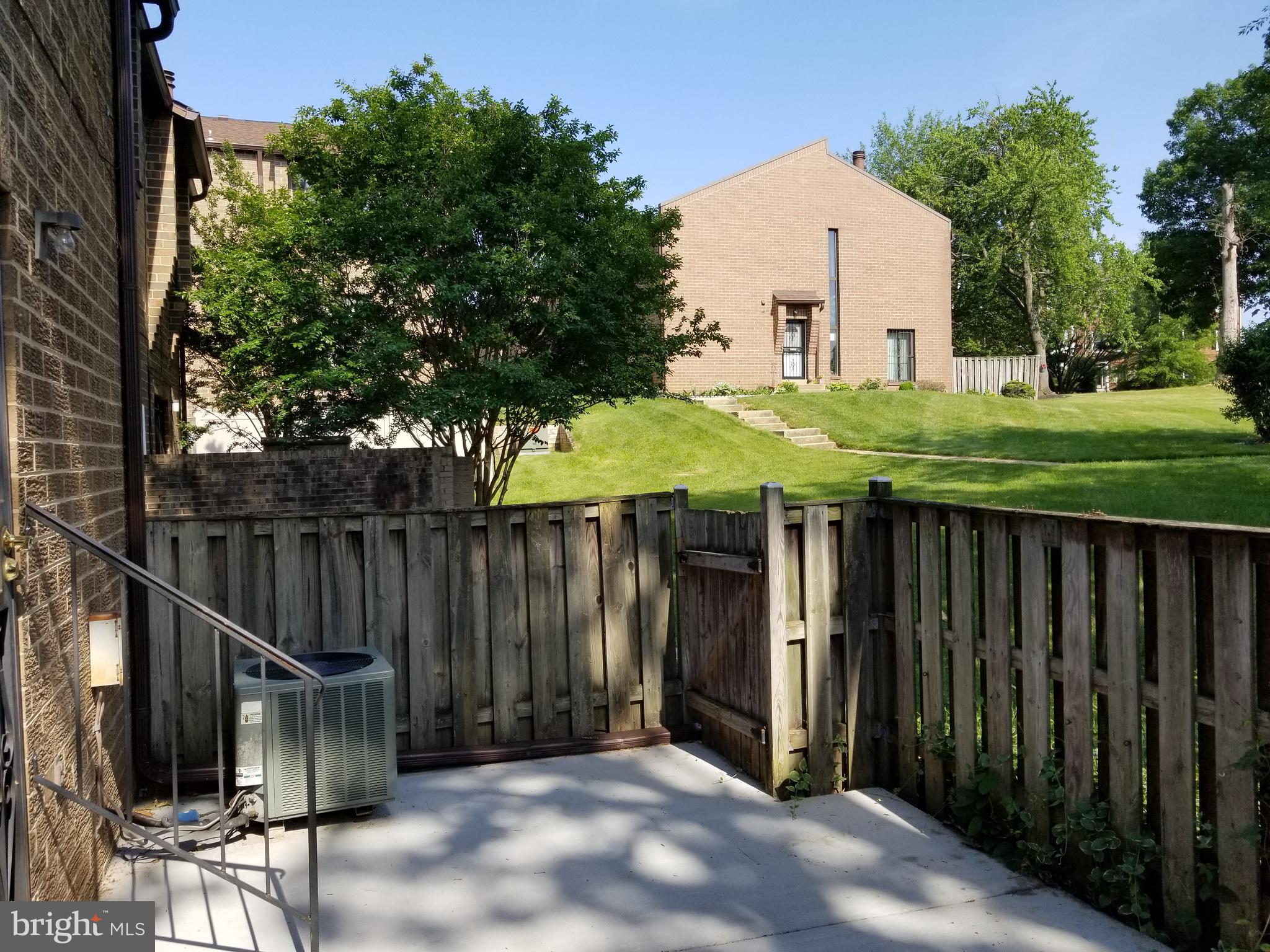 3153 Apple Road Northeast, Unit 5 Washington, DC 20018 - Photo 30 of 38 Fenced Yard/Gate to Common Area