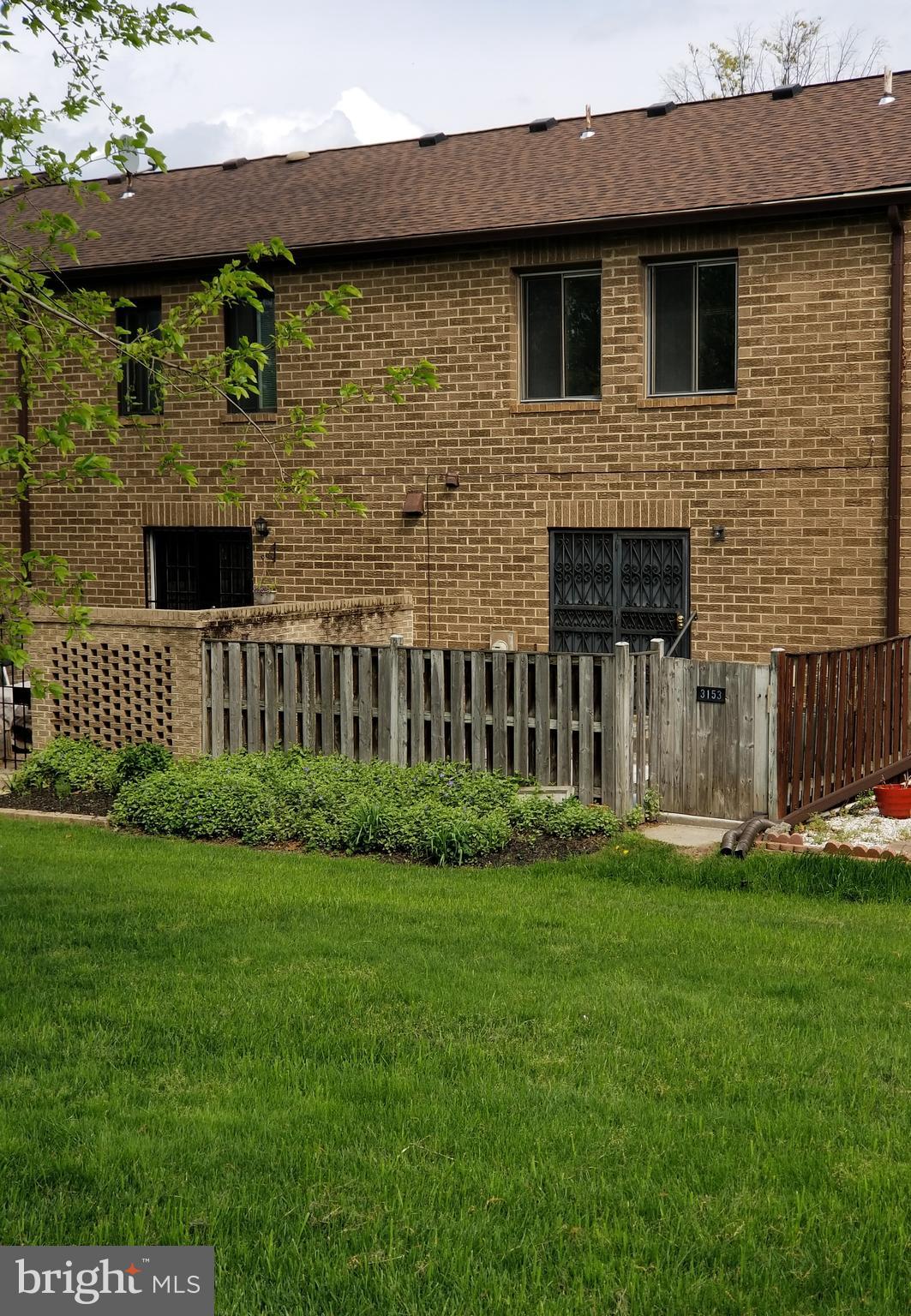 3153 Apple Road Northeast, Unit 5 Washington, DC 20018 - Photo 33 of 38 Rear Fenced Yard