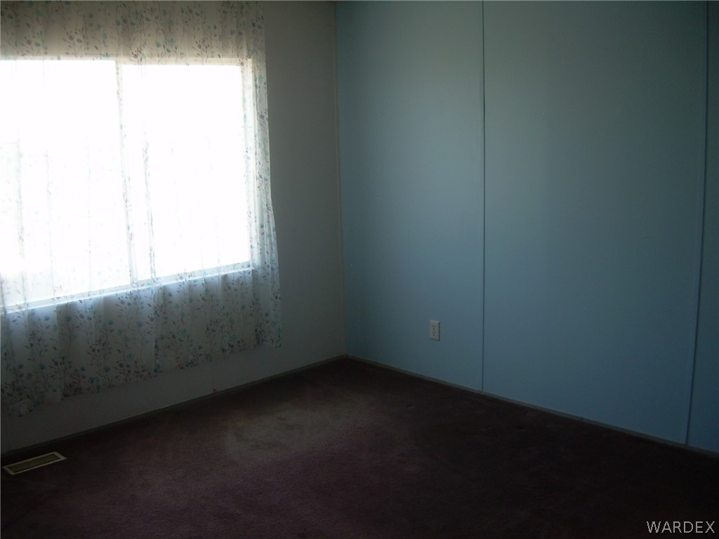 3644 Eloy Road Golden Valley, AZ 86413 - Photo 25 of 35 a view of an empty room and window
