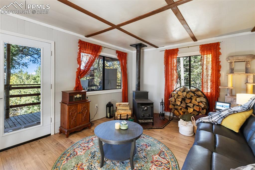 679 Calcite Drive Divide, CO 80814 - Photo 14 of 35 a living room with furniture and a large window