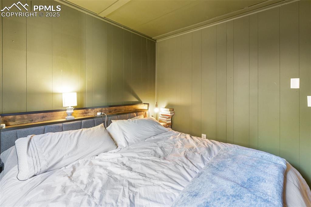 679 Calcite Drive Divide, CO 80814 - Photo 18 of 35 a bed room with a bed