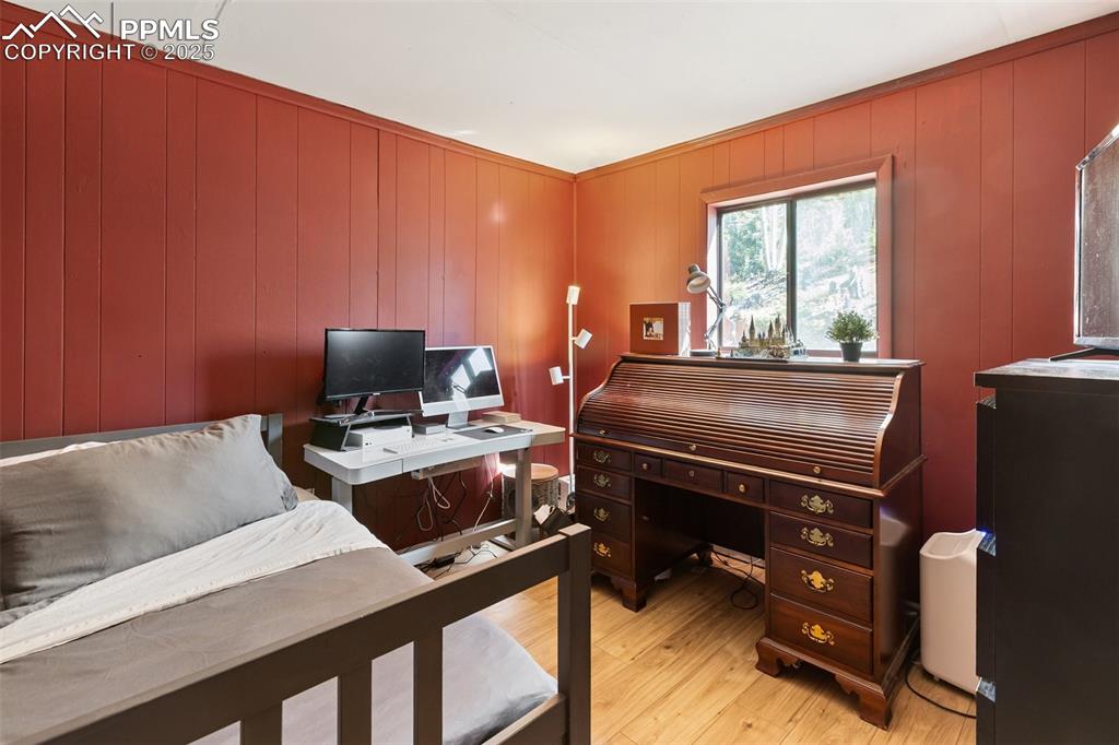 679 Calcite Drive Divide, CO 80814 - Photo 22 of 35 a room with furniture and a window
