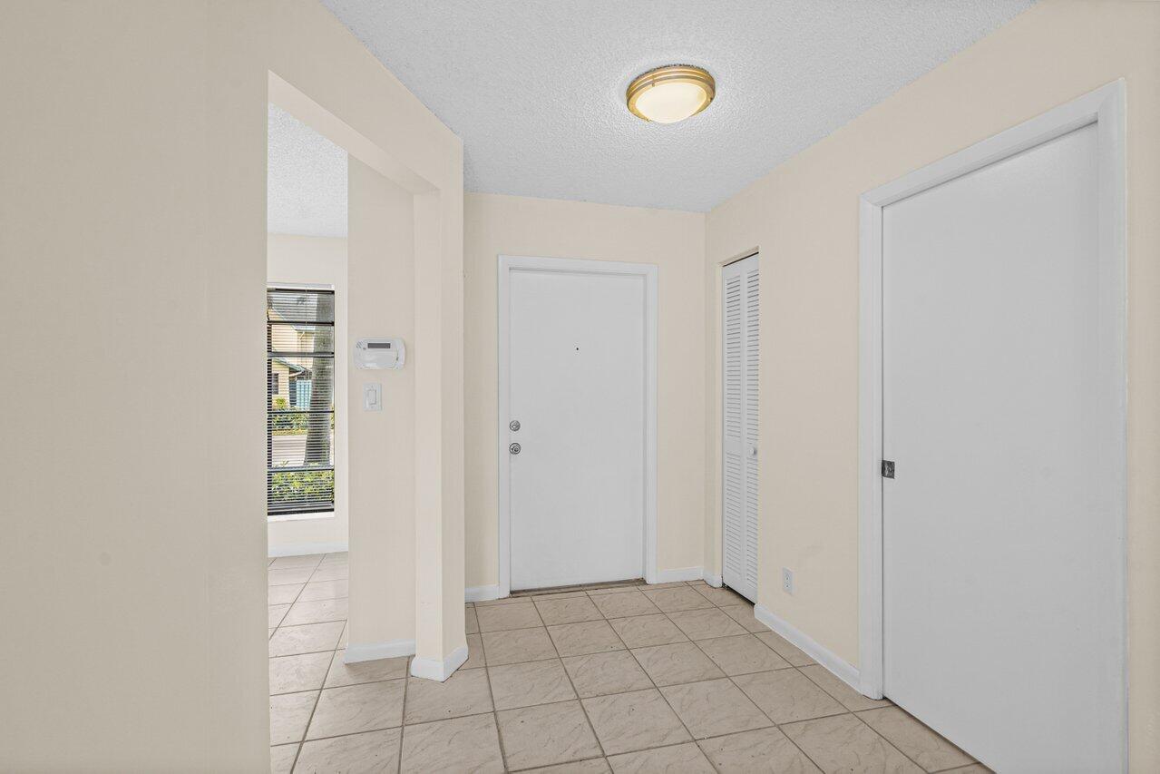9112 Southwest 21st Court, Unit E Boca Raton, FL 33428 - Photo 3 of 23 005-9112Southwest21stCourt-BocaRaton-FL-