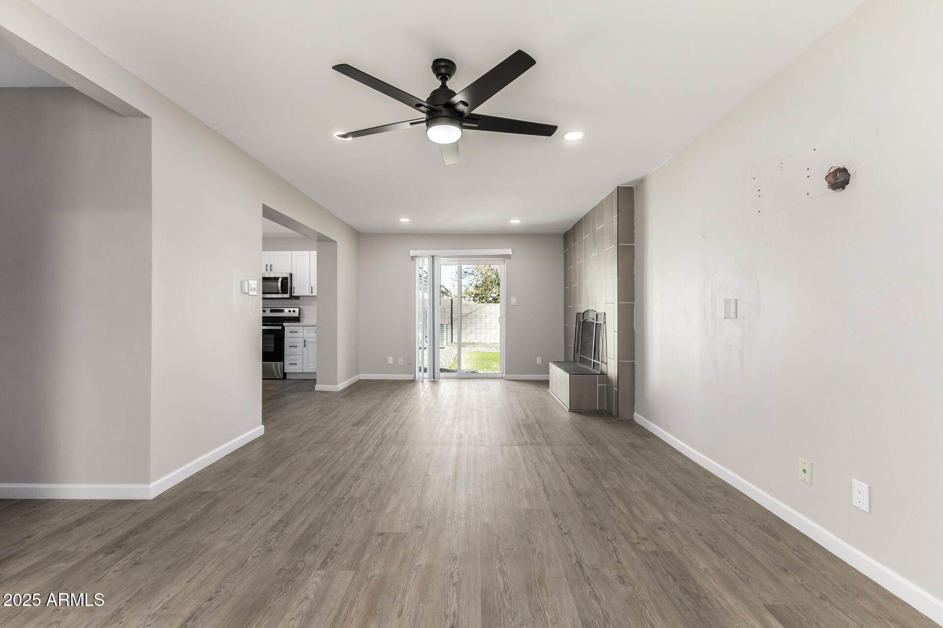 331 East Pierce Street Tempe, AZ 85288 - Photo 11 of 37 wooden floor in an empty room with a window