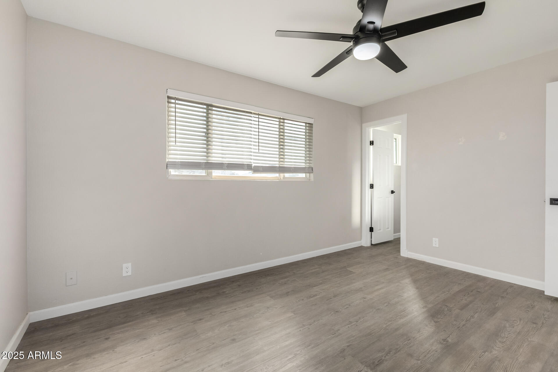 331 East Pierce Street Tempe, AZ 85288 - Photo 16 of 37 a view of an empty room with a window