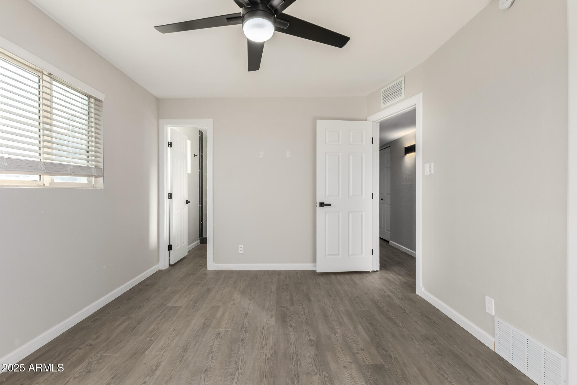 331 East Pierce Street Tempe, AZ 85288 - Photo 17 of 37 a view of an empty room with a window