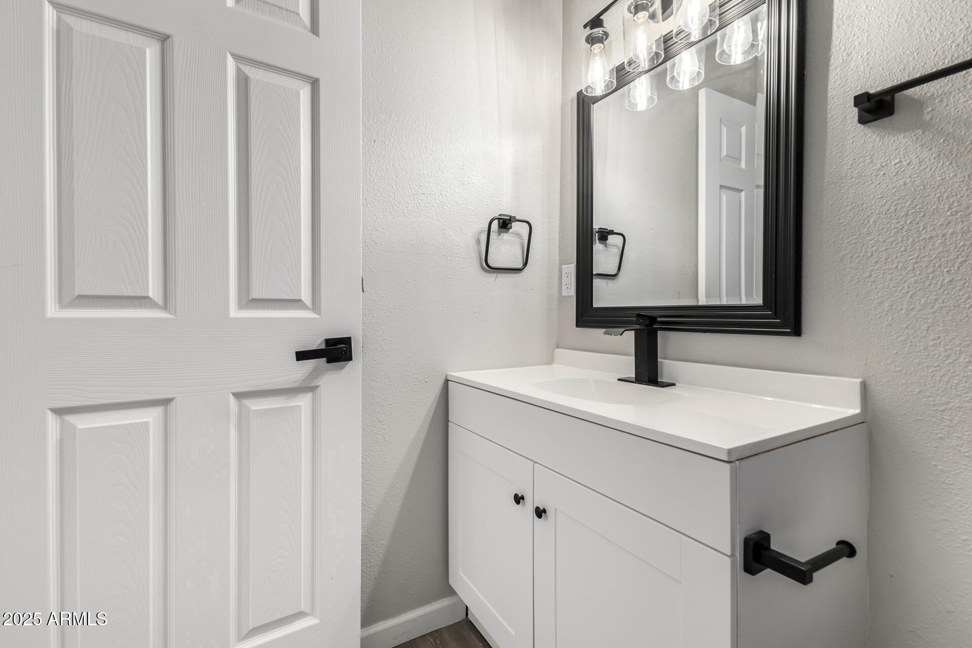 331 East Pierce Street Tempe, AZ 85288 - Photo 21 of 37 a bathroom with a sink and a mirror