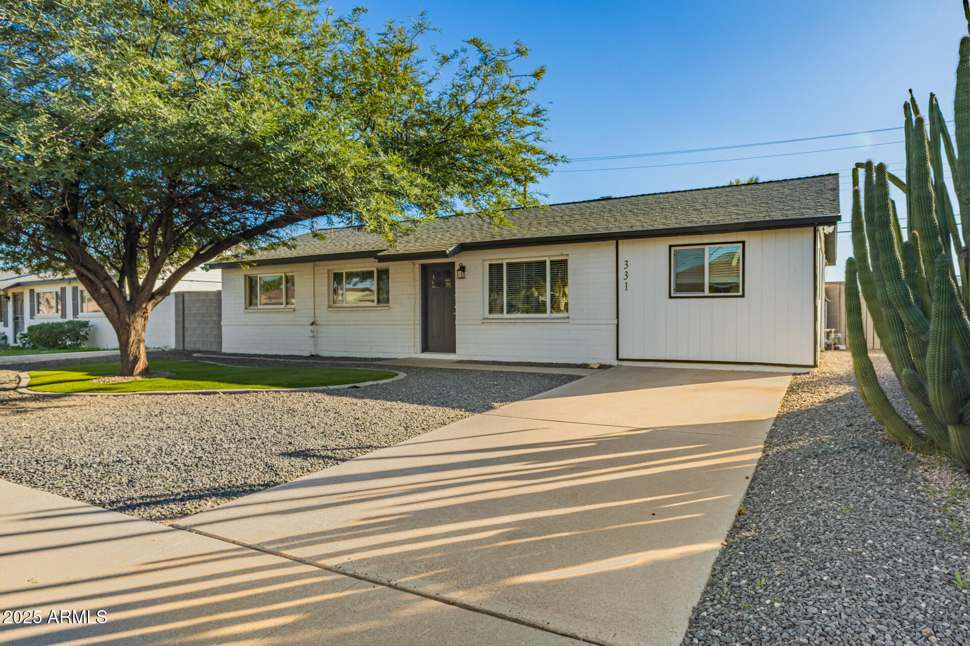 331 East Pierce Street Tempe, AZ 85288 - Photo 3 of 37 a house view with a backyard space