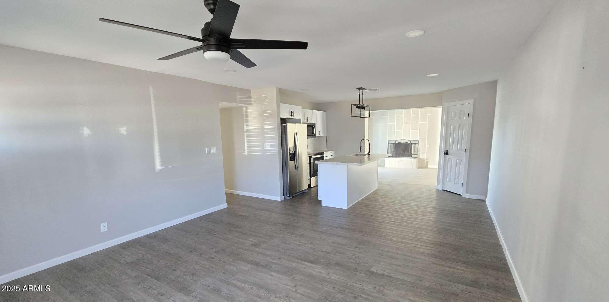 331 East Pierce Street Tempe, AZ 85288 - Photo 36 of 37 a view of a kitchen with a refrigerator and a window