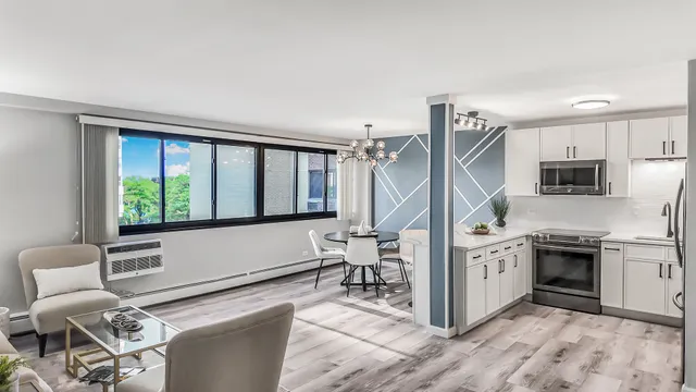 a kitchen with stainless steel appliances granite countertop a stove and a sink