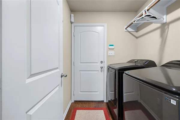 a utility room with dryer and washer