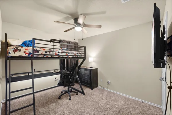 a view of a workspace with furniture