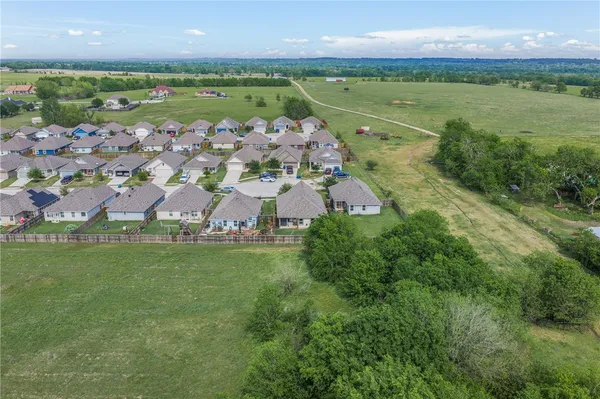 a view of a city with an ocean