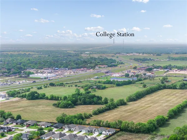 a view of a street with an ocean view
